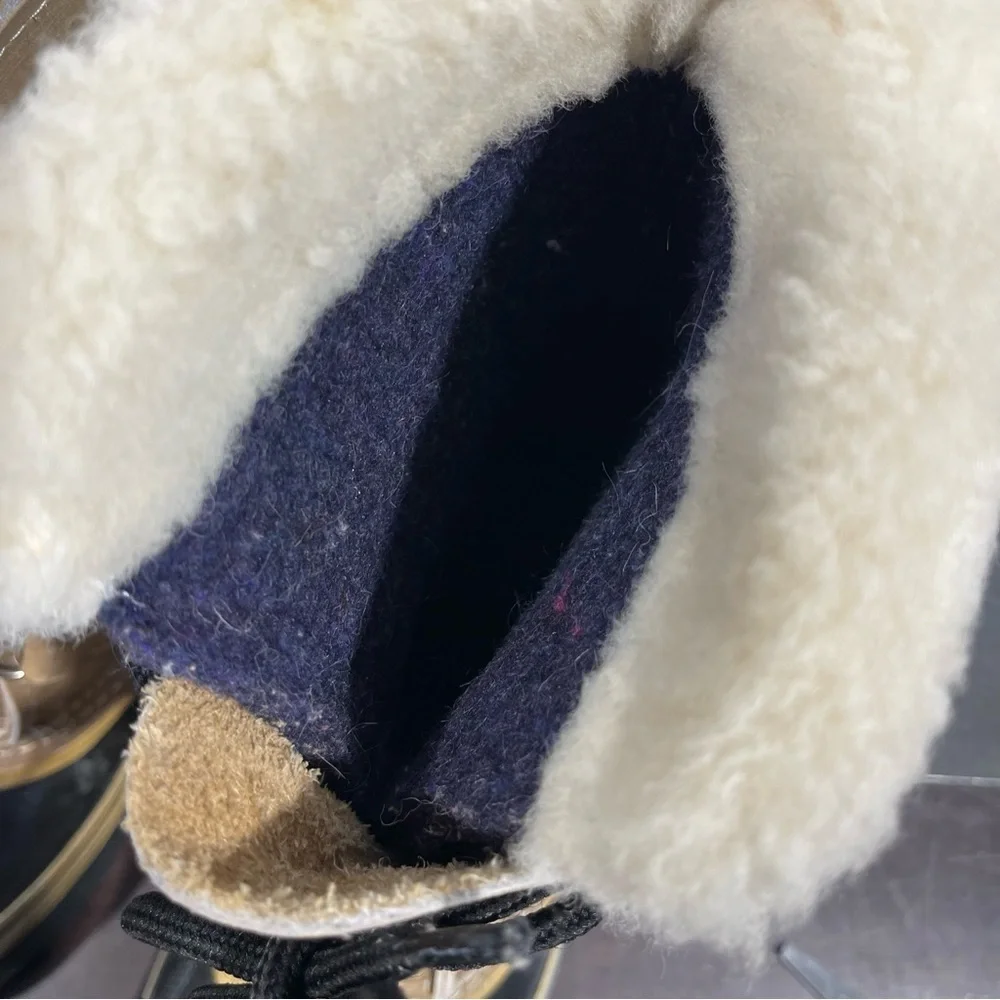 Sorel Tan and Black Winter Boots